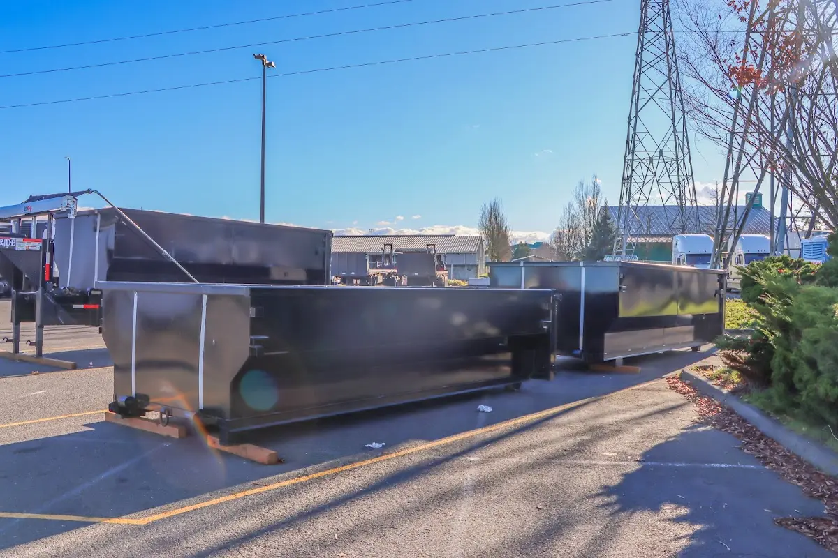Roll-off dumpster ready for waste disposal at job site for Roofing Dumpster Rental in Havelock